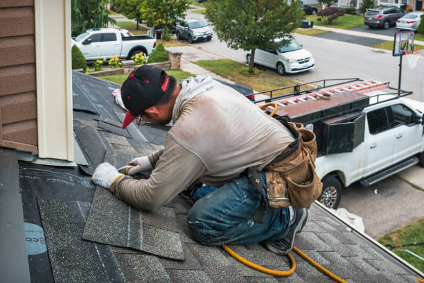 Professional Roof Replacement technician working in Grassflat, PA